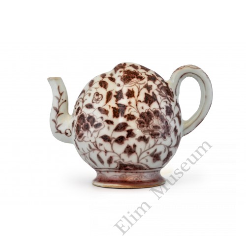 1428 An early Ming underglaze red peach  shape back-flow ewer